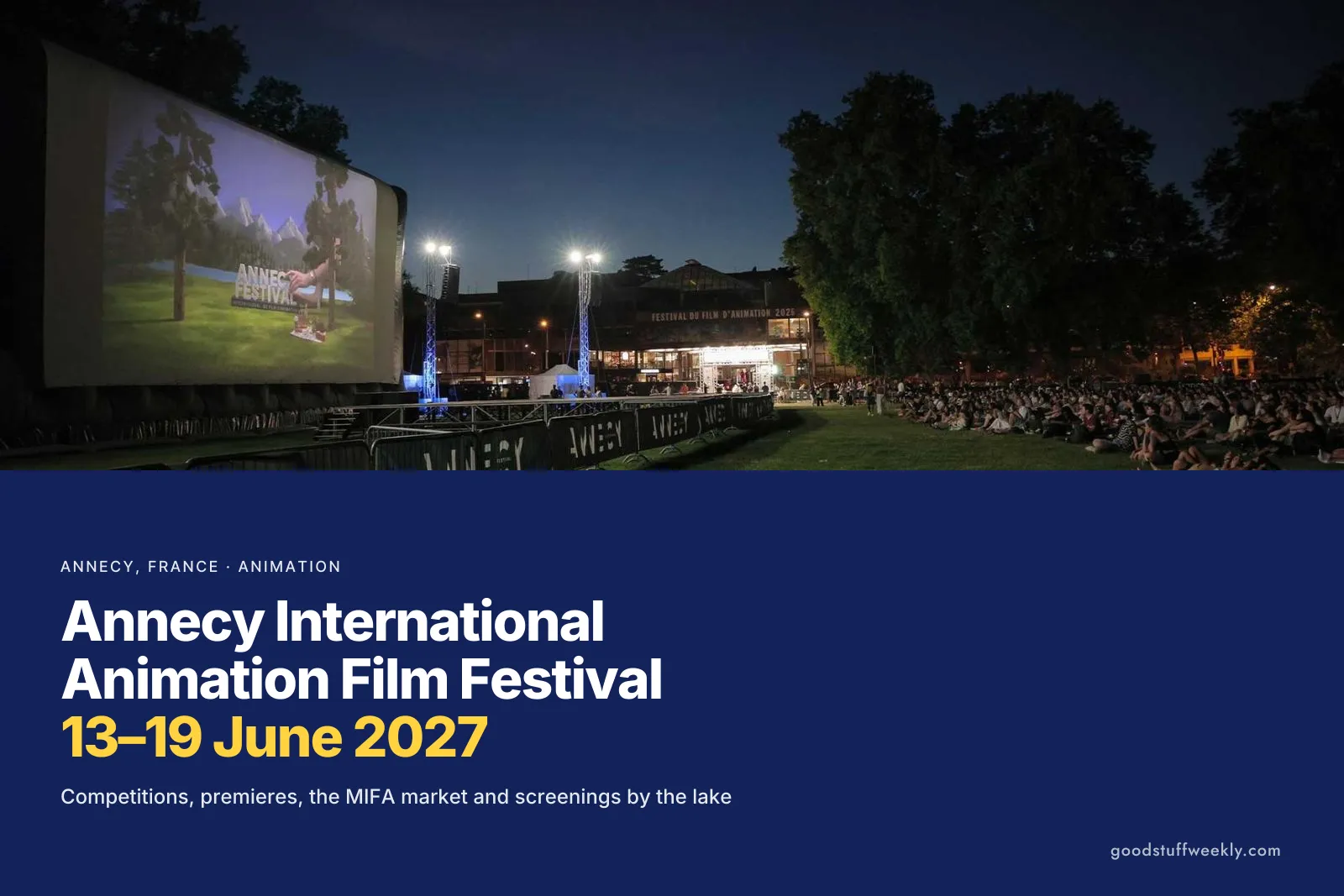 An open-air screening at night on the lakeside lawn during the Annecy Festival