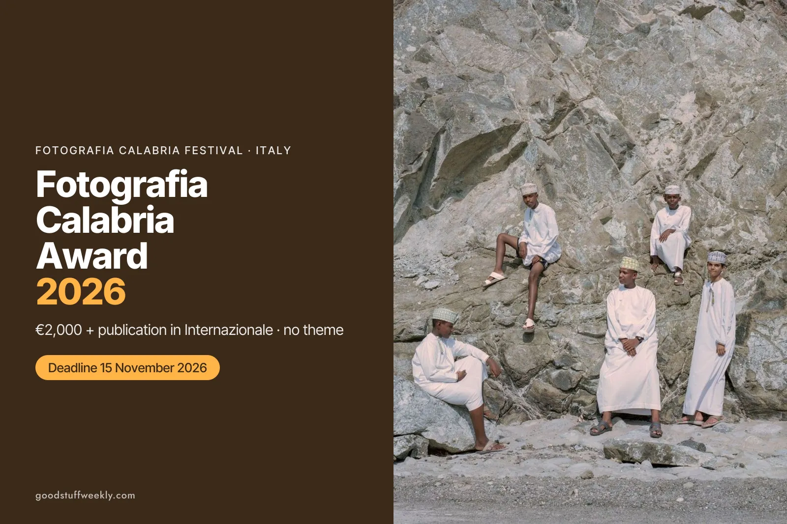 Four men in white robes sitting and standing on a large rock, from the Fotografia Calabria Festival Award call