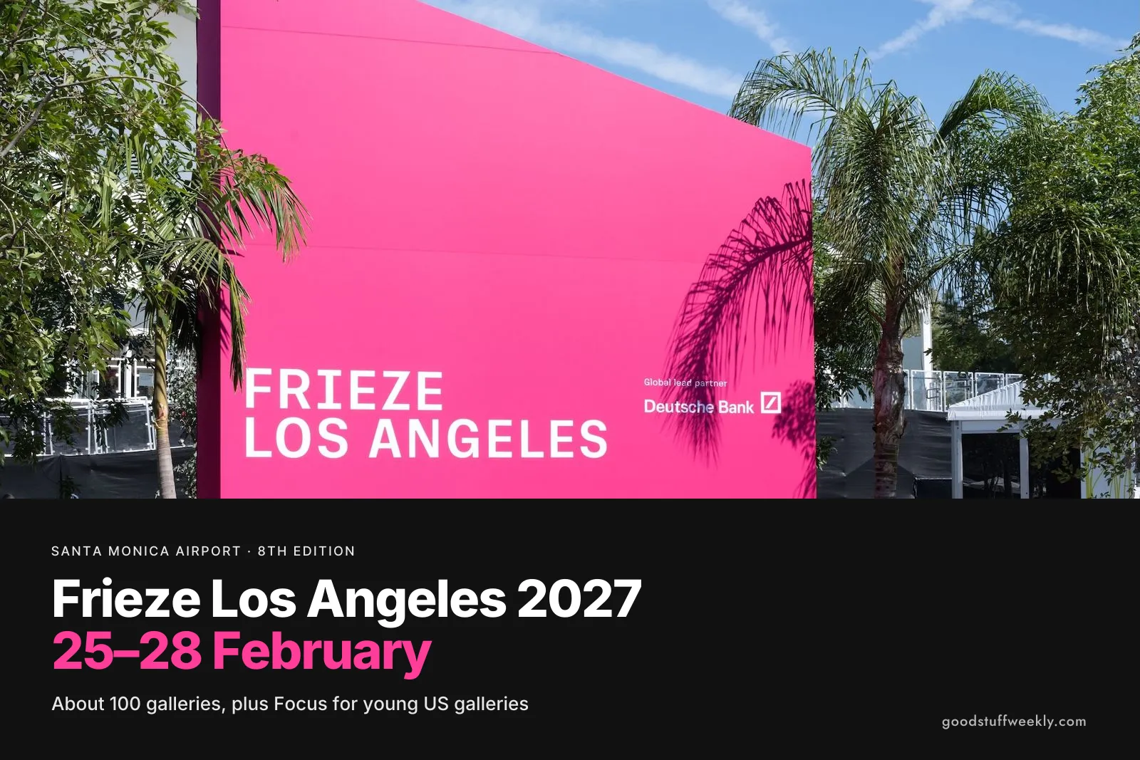 The pink Frieze Los Angeles wall among palm trees at the Santa Monica Airport campus