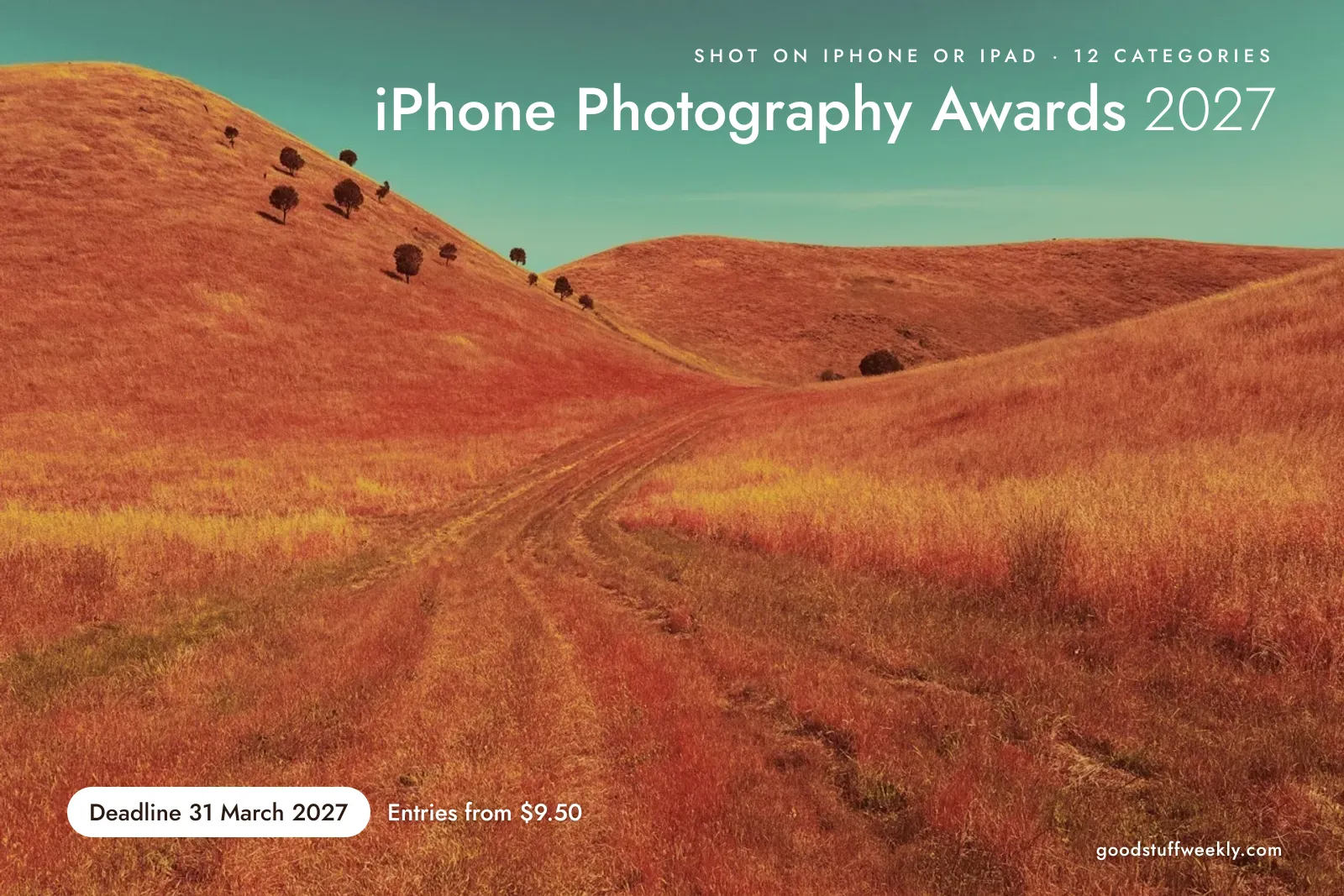 iPhone Photography Awards 2027: rolling hills of orange-red grass with a dirt track and small trees under a teal sky; deadline 31 March 2027