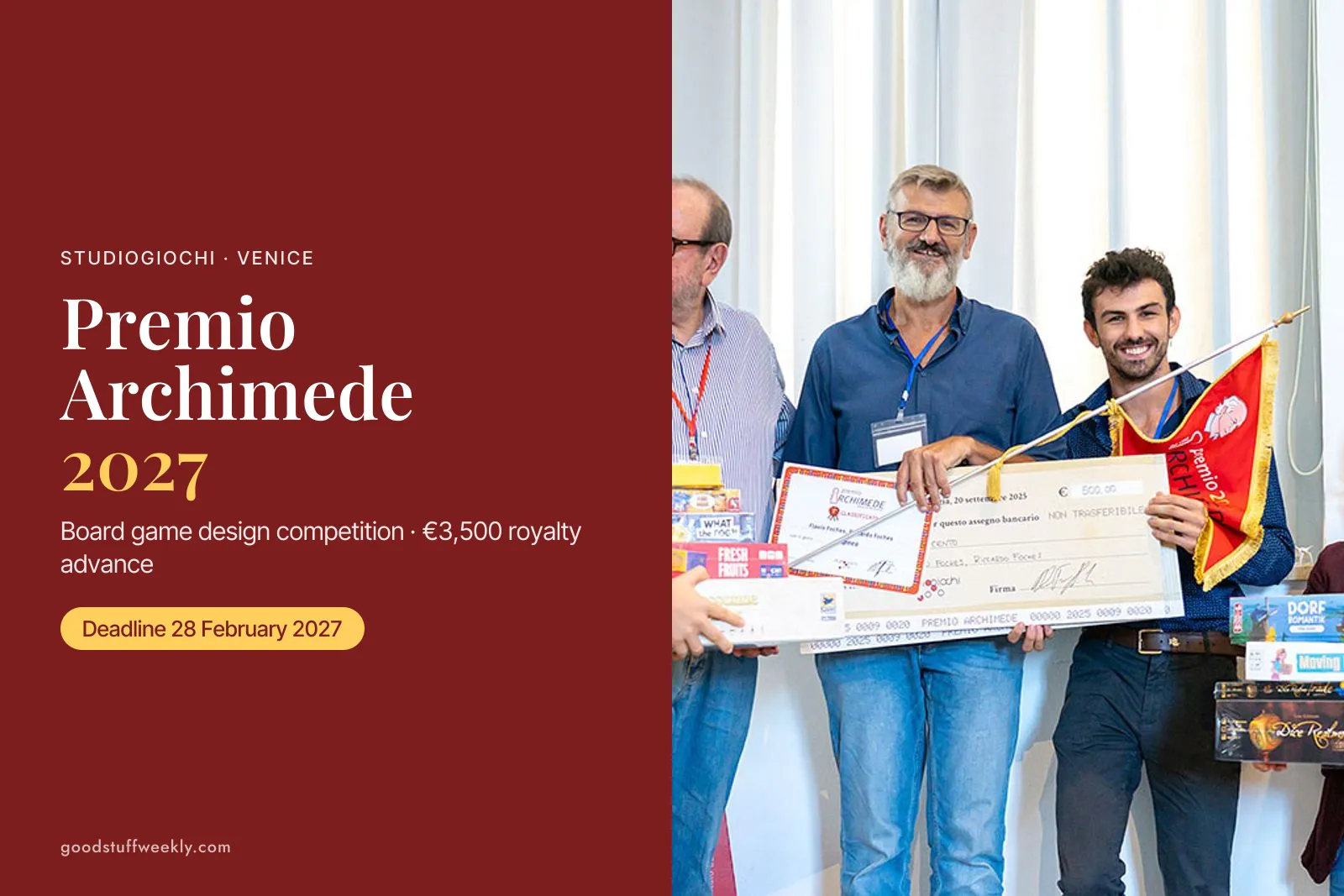 Premio Archimede winners holding a prize cheque and board games at the ceremony in Venice