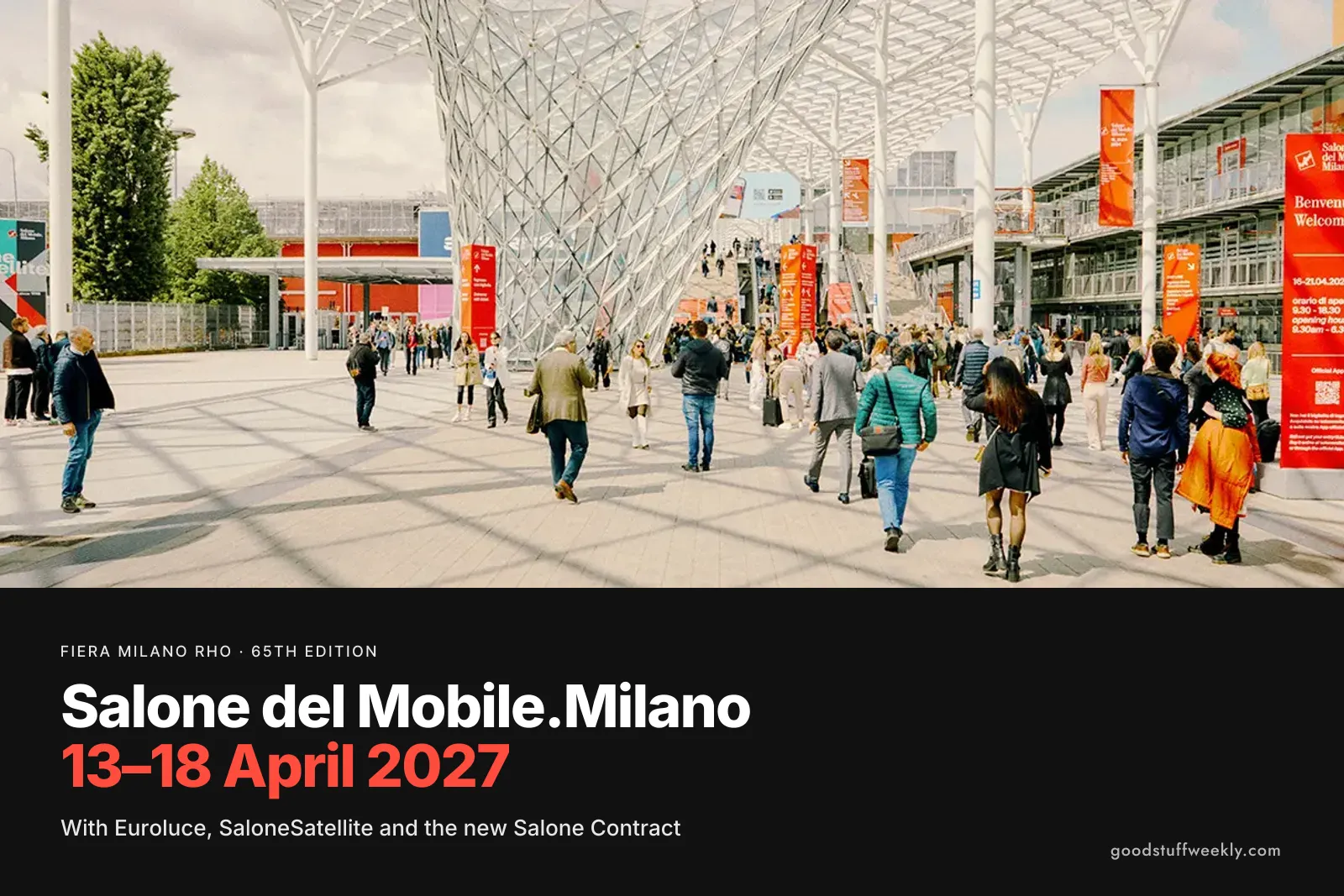 Crowds walking under the glass canopy of Fiera Milano Rho during the Salone del Mobile