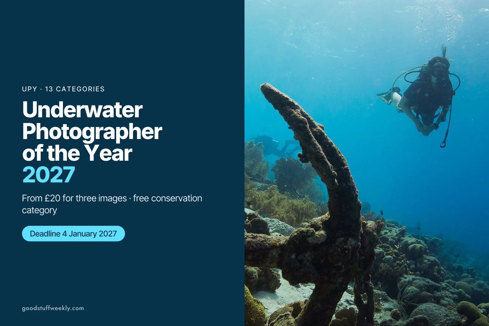 A scuba diver swimming above a coral-covered anchor in clear blue water off Bonaire